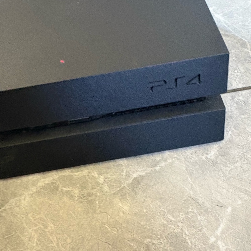 Sony PS4 Gaming Console - Sleek Black